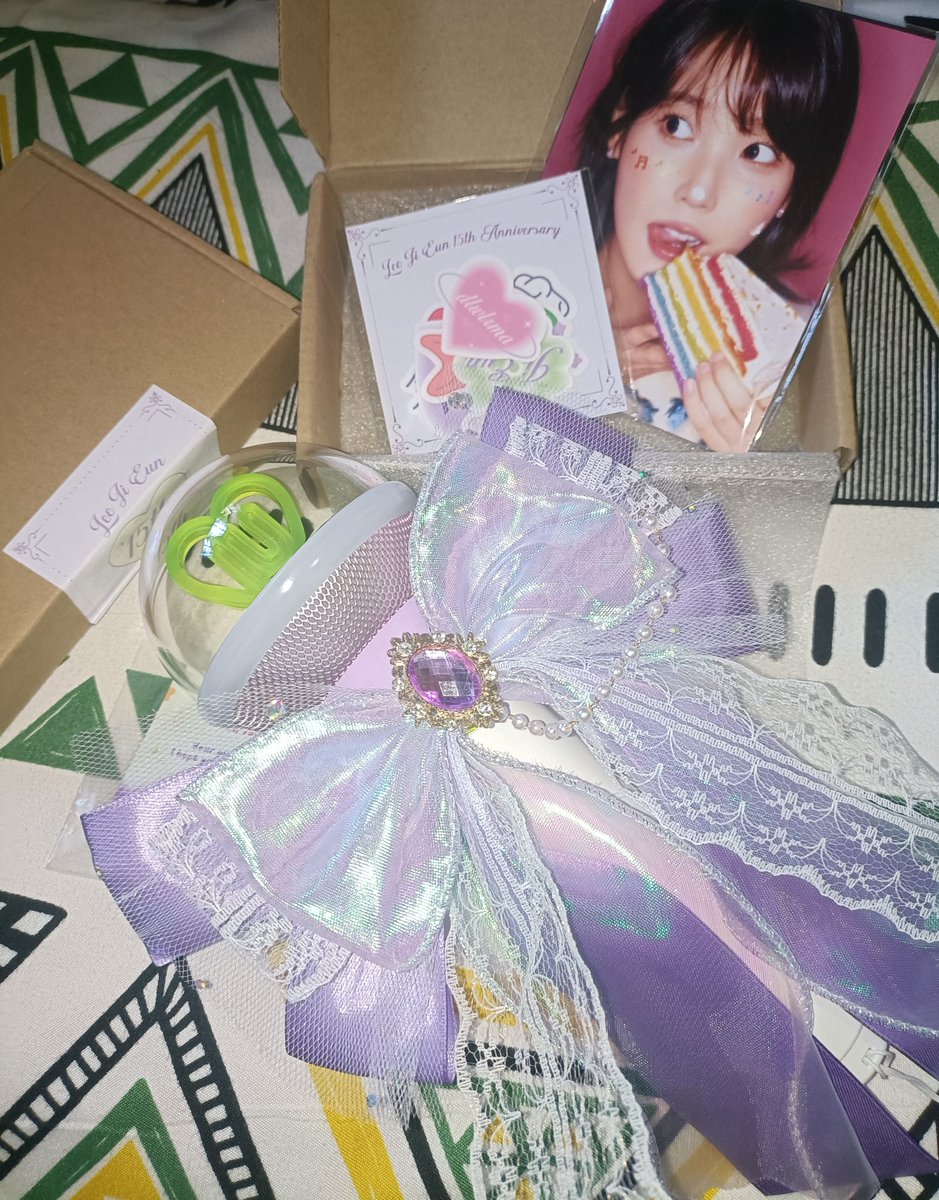 elilyy_'s tweet photo. Thank you very much @bIUdol_ @iu_zone! 🥹🫶🏻 my friend and i are one step closer to having fun at the IU concert with this package. it's really pretty, salamat po ng marami for this budol. didn't expect it to arrive today haha 🪽💜 https://t.co/ADrUpiHupE