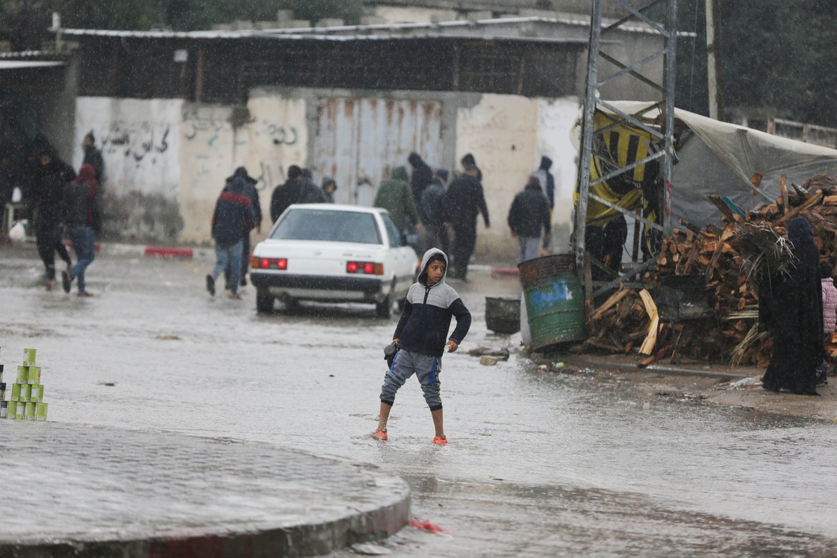 UNRWA's tweet photo. Wet weather in📍#Gaza has intensified suffering for hundreds of thousands of displaced people, making an already unbearable situation completely uninhabitable.
Many people were forced to flee with just the clothes on their back. Families are now sleeping in water on the floor. https://t.co/3LccfkGpwT