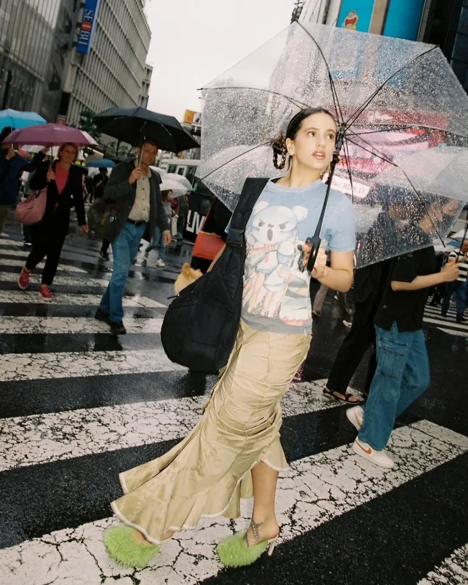 saintdemie's tweet photo. rosalía in tokyo, photographed by yuri horie 🌸 https://t.co/bjciyrNf5i