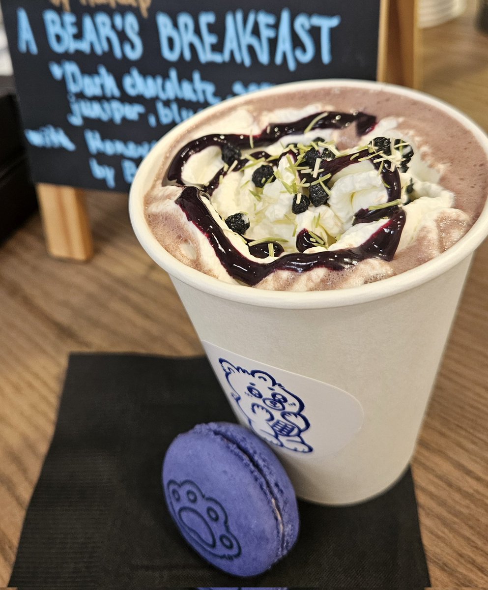 Margaretb_yvr's tweet photo. Check out this #hotchocolatefest offering at @granville_isle - A Bear's Breakfast is available at Kasama Chocolate and features dark chocolate topped with blueberries, juniper and spruce, and served with a Bon Macaron - can you bear it? 🐻 https://t.co/HaKCpDjrd9