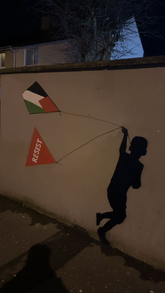 On a wall in Derry. 
From #FreeDerry to #FreeGaza We Shall Overcome.
The #BloodySunday commemoration. 
#WeAreAllGaza