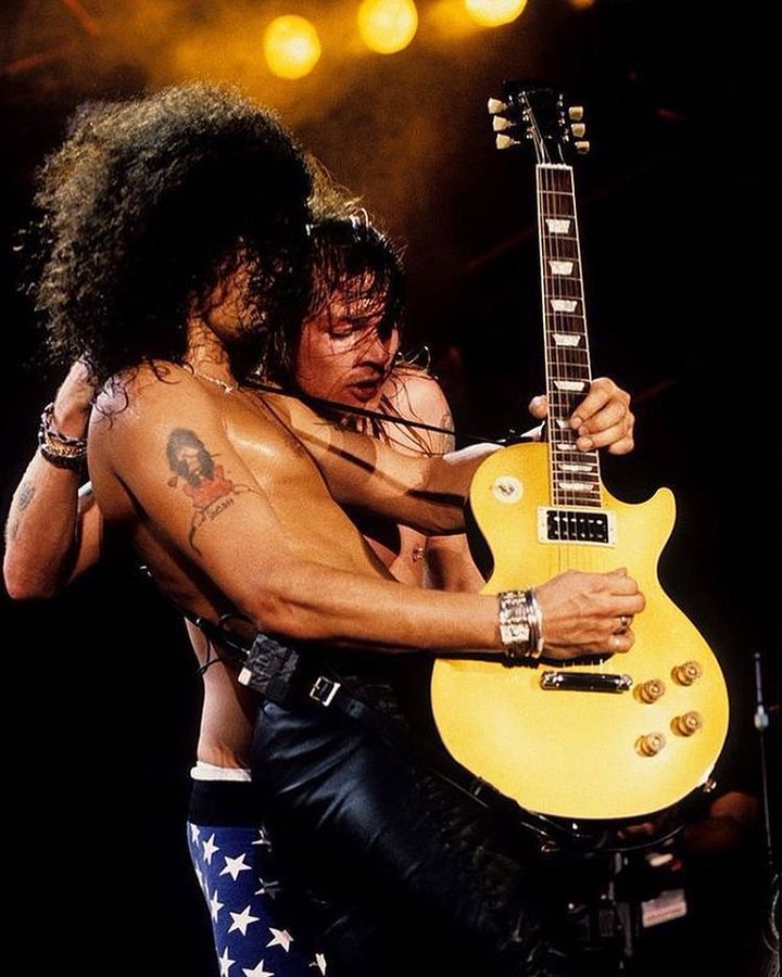 crockpics's tweet photo. Axl Rose &amp; Slash at Rock In Rio, 1991. Photo by Kevin Mazur. https://t.co/kelKX1NYT3