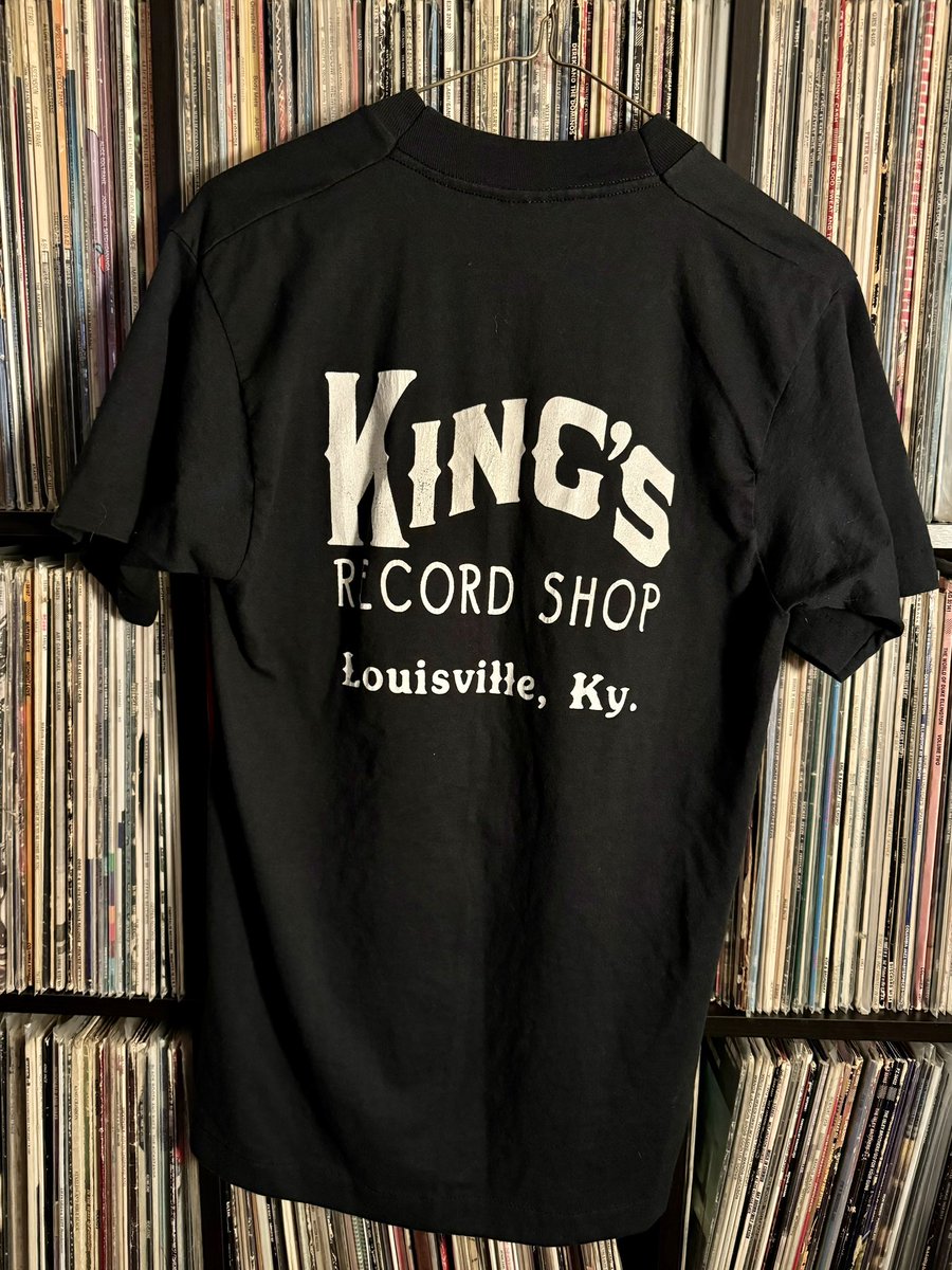 Whilst digging for old Kentucky records I had the great luck of finding an original t-shirt from King’s Record Shop. The shop owned by Gene King (brother of Pee Wee King) was located in downtown Louisville from 1959-1993.
