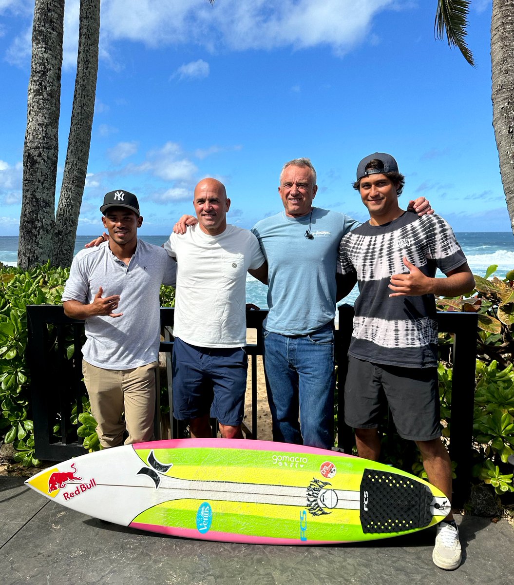 RobertKennedyJr's tweet photo. Great day surfing today with World Surf Champion @KellySlater at Pua'ena Point Beach and meeting two other globally renowned surfers Matahi Drollet + Shayden Pacarro with Pipeline behind us. https://t.co/7jhwpDIZKC