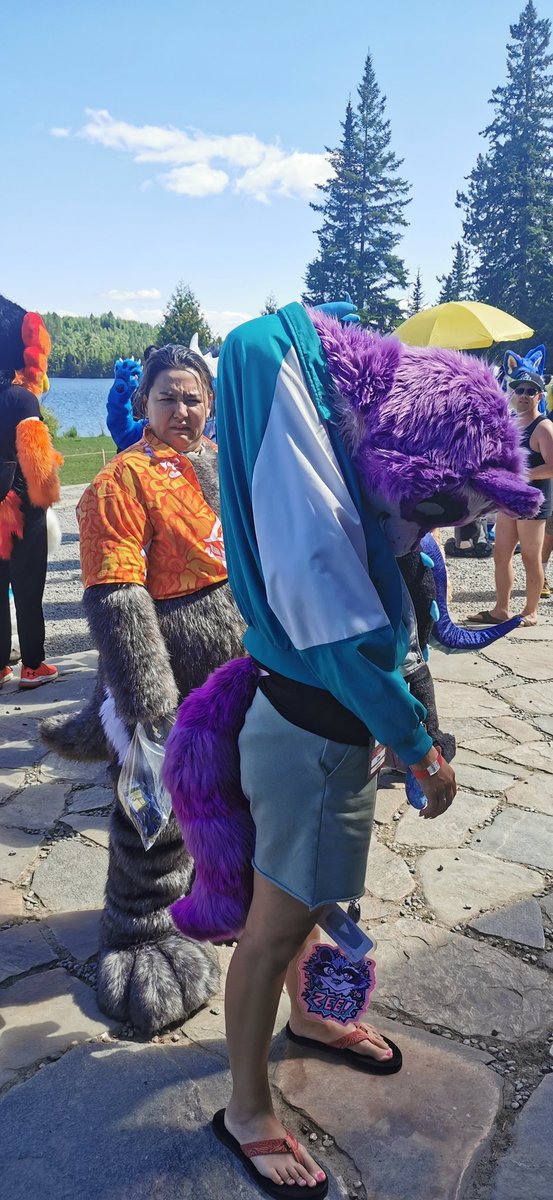 oh my god @shortsnootfox got this pic of me and @eevachu at feral 😂