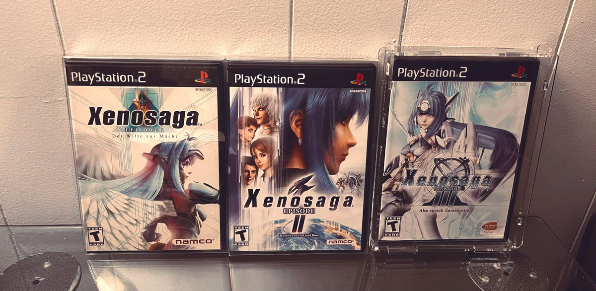 FakePearBear's tweet photo. For #TrilogyTuesday this week I am showcasing the incredible futuristic JRPG series called Xenosaga for the PlayStation 2. This is a stunning turn-based combat series that has stood the test of time VERY well.
Also Xenosaga III is like $250 now, hence the acrylic casing. RARE. https://t.co/diKp15bcWv