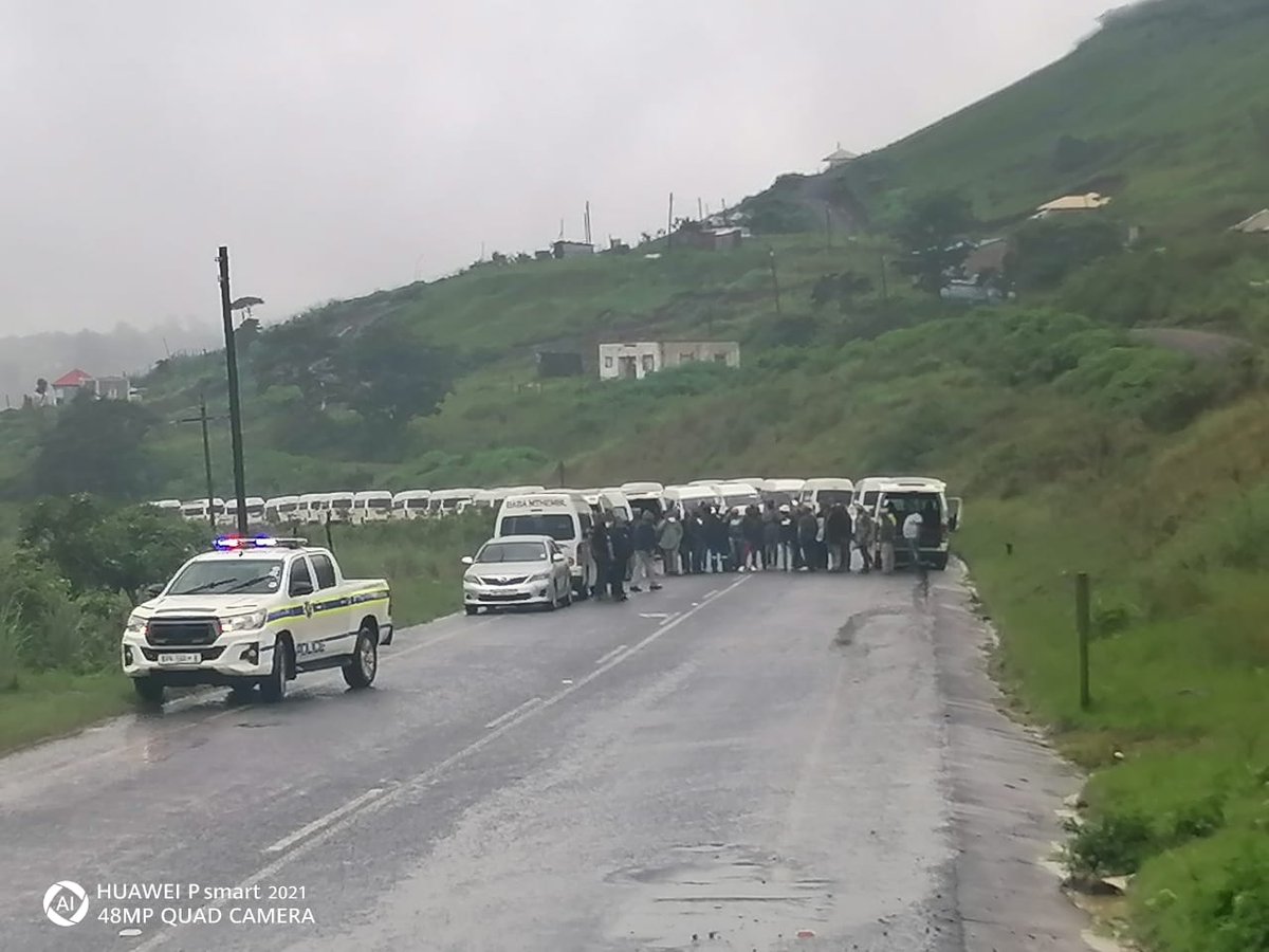 TrafficSA's tweet image. Eastern Cape - R61 Route:  #TaxiViolence taxis blocking the road between Port St Johns and Lusikisiki