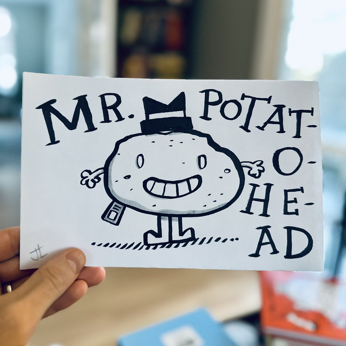 Meet Mr. Potatohead, a character my six-year-old made up (and I drew). He is secretly a tomato (see that zipper? see that stem-hiding hat?), but doesn’t think he looks good in red. His best friend is a hunk of bread, named Mr. Bread. As far as I know, Mr. Bread is actually bread.