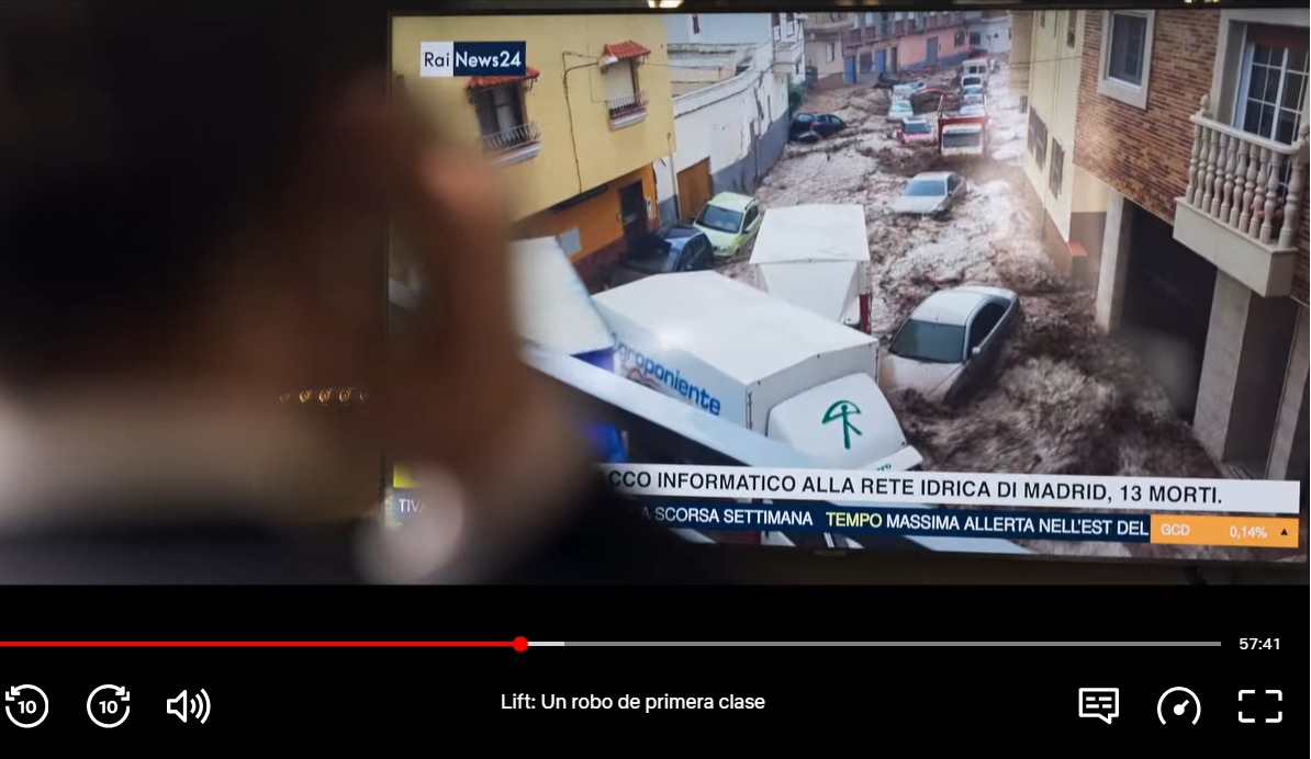 IvanCiudadanoA's tweet photo. Las inundaciones de #Adra se cuelan en la película más popular de @netflix. En una escena de 'Lift, un robo de primera clase' la televisión muestra un camión de Agroponiente, con el tradicional indalo, arrastrado con otros vehículos por una tromba de agua https://t.co/XnYmWD5pSh https://t.co/LkPUVtEu9u