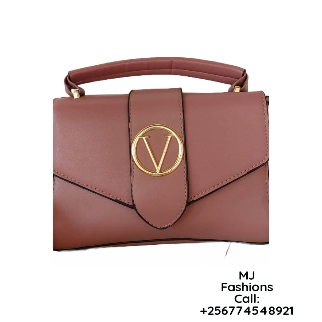 Buy Metro Pink Textured Medium Handbag For Women At Best Price @ Tata CLiQ