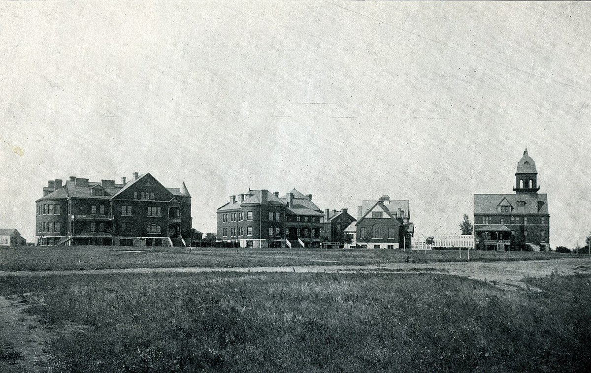 The North Dakota State Hospital, Jamestown, North Dakota, circa 1900. Built in 1885, it reached peak population in the 1940s. In 1998, several hospital buildings were converted to a medium-security prison, an ironic symbol of our nation's criminalization of severe mental illness.