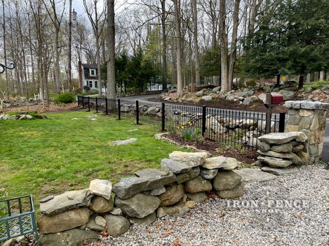 We love the combination of this beautiful rock wall with the perfect touch of iron from our iron fencing.

#IronFenceShop #ironfencing #rockwall #security #curbappeal