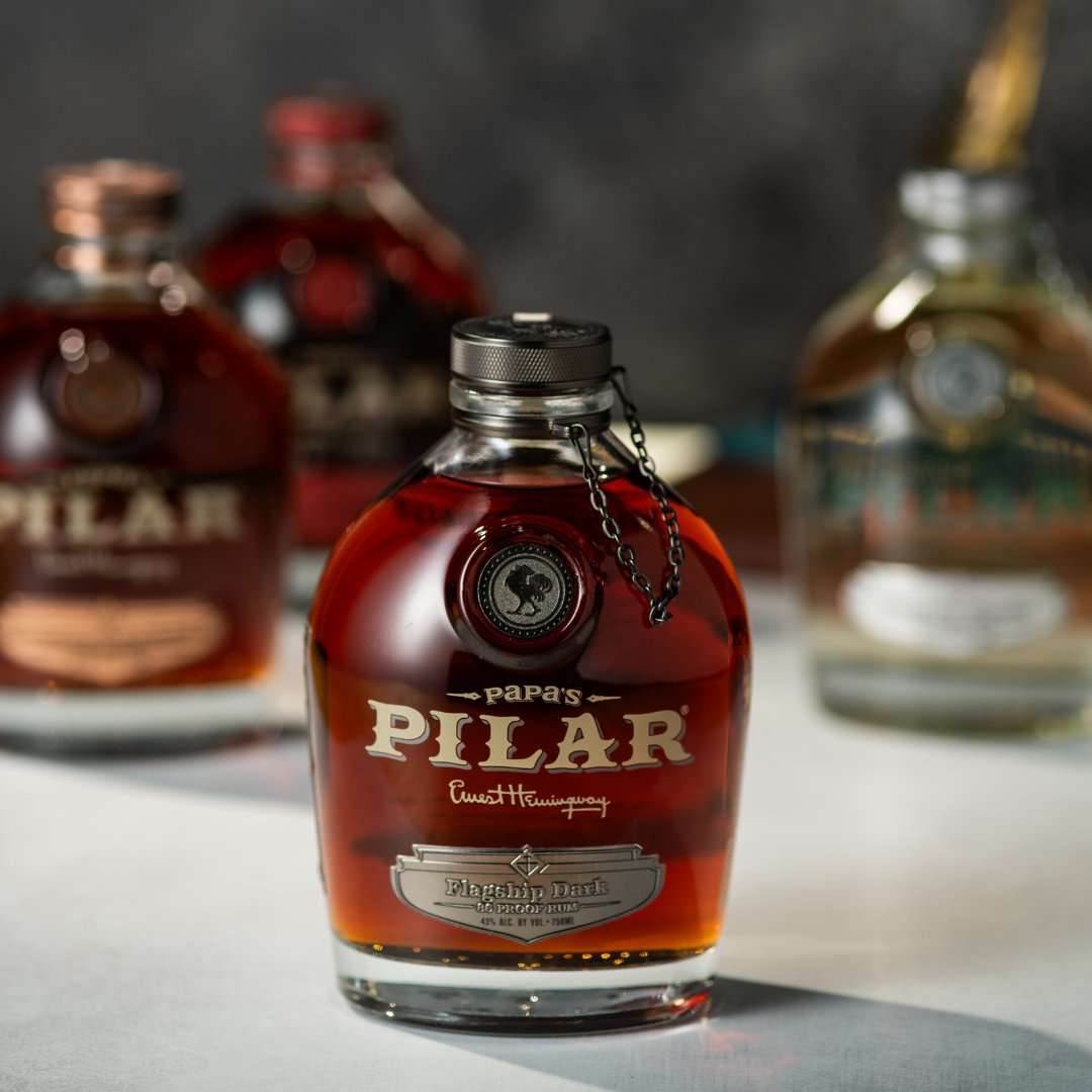 papaspilar's tweet photo. Introducing a new era of ultra-premium rum with our latest bottle design featuring a distinctive new color palette, metal badges, rooster medallion, and more. If you’re out and about, snap a picture of our new bottles and tag us with #NeverASpectator for a chance to be featured! https://t.co/Gd5Cn2UEt2