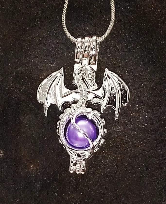 Butch81356's tweet photo. Beautiful dragon pendant with pearl inset and silver necklace. For details visit Etsy at Nature Inspirations 4 U or dm for more information. https://t.co/uzYrfx85aw