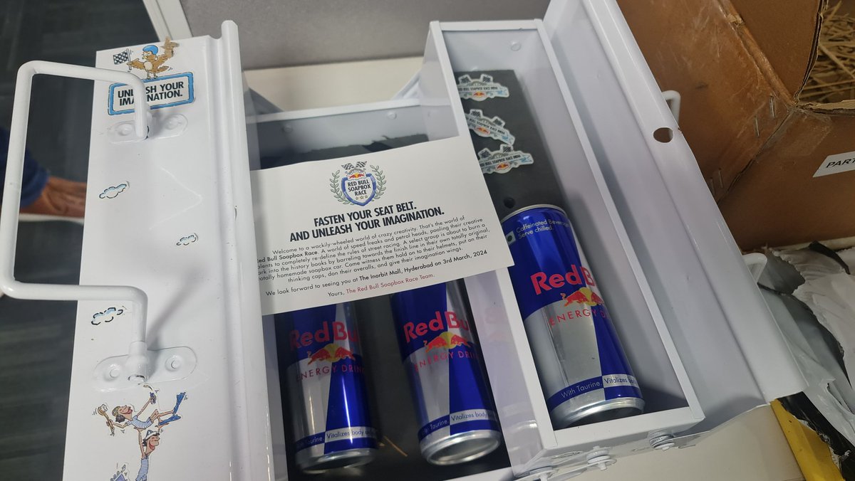 This is a pretty interesting invitation for the Red Bull Soap Box Race. A tool box, with Red Bull (for the energy obviously), a screw driver and measuring tape!