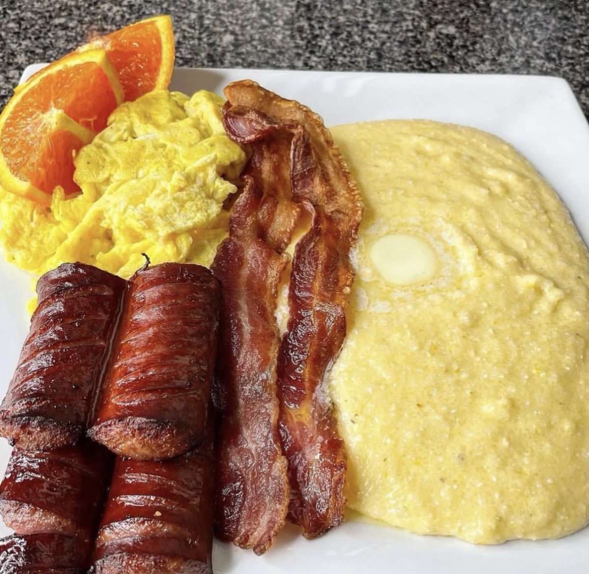Cheese Grits, Eggs, Smoked Sausage and Bacon…. eat or pass 🤤