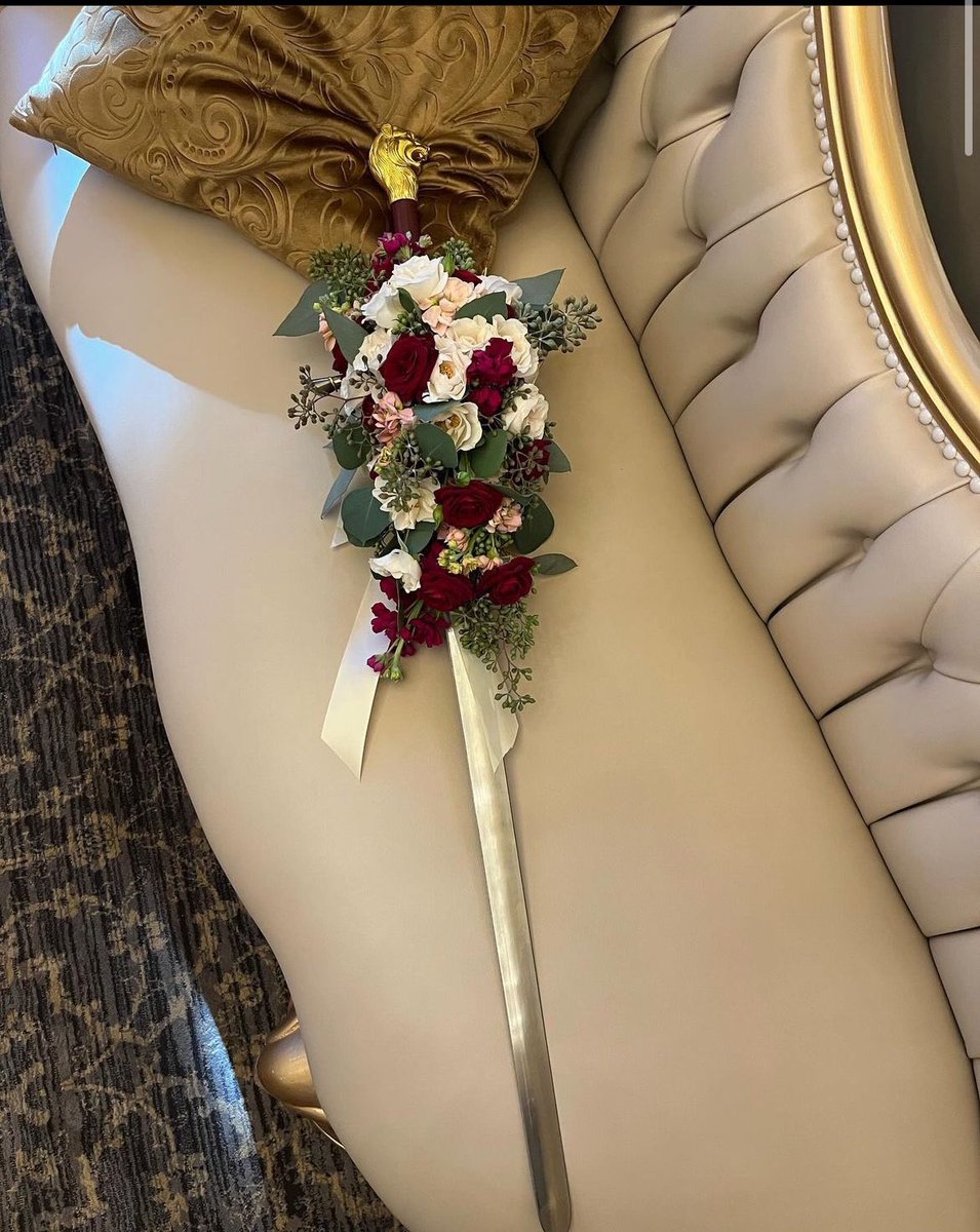 mortalken's tweet photo. Enormous eternal congratulations to beautiful humans @BriannaCherry &amp; @Teatraybat1 on their more perfect union. Just when you think the joy they bring to the world can’t be any greater … this.

And Kit’s sword bouquet? So sharp.
Kudos and all good fortune, friends. https://t.co/xlkjfjDZ1h