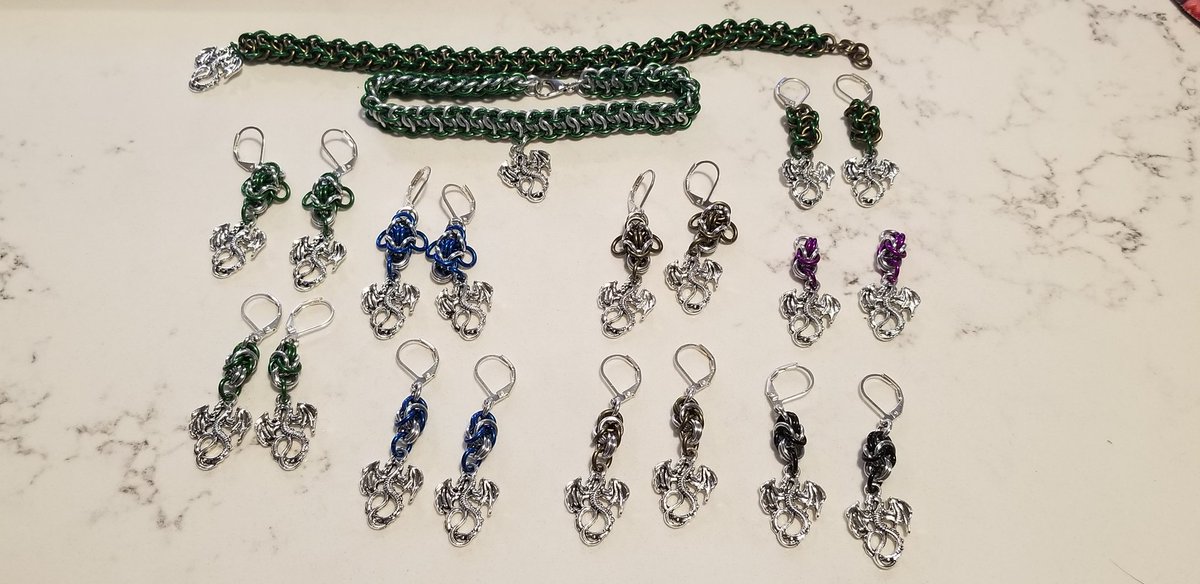 Dragons on chains.
Stayed up half the night making these chainmaille babies.

#monkeyshines2024
#yotdragon