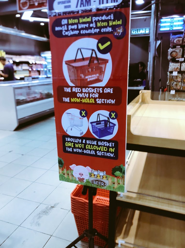 Di sebuah supermarket di Lintas KK. Basket untuk Halal dan Non Halal termasuk alkohol diasingkan. Apakah duit kertas juga akan diasingkan untuk golongan 'mereka' dan Non??