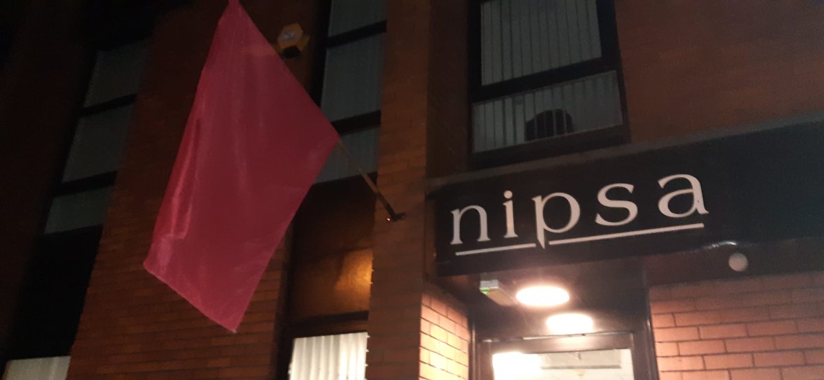 The Red Flag proudly flying over NIPSA HQ at the start of #strike day - #solidarity to all the striking workers taking action for fair pay, safe staffing and properly funded public services! Up the Strikers!