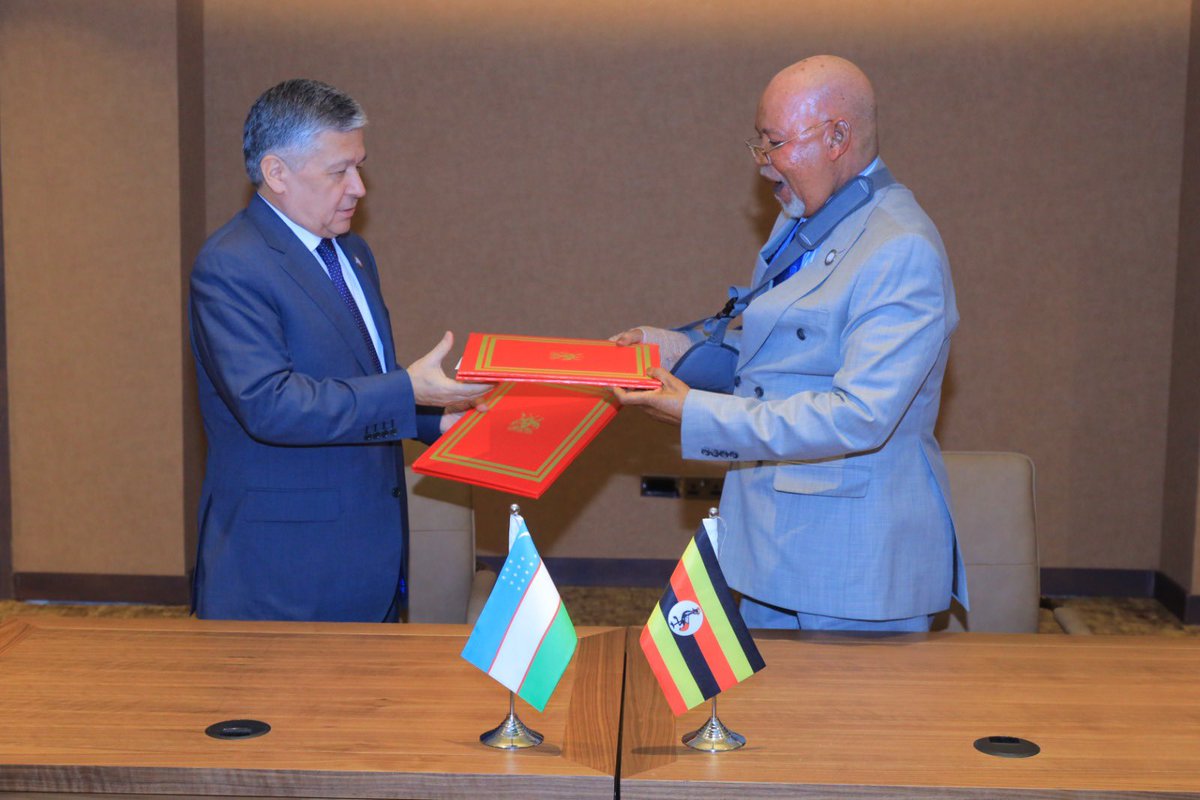 UgandaMFA's tweet photo. The Minister of Foreign Affairs, Hon. @GenJejeOdongo , and H.E. Bakhromjon Aloyev, Deputy Minister of Foreign Affairs for the Republic of Uzbekistan, have signed a M.O.U to establish diplomatic relations. This significant event took place during the #NAMSummitUg2024. https://t.co/iBcekEkXYk