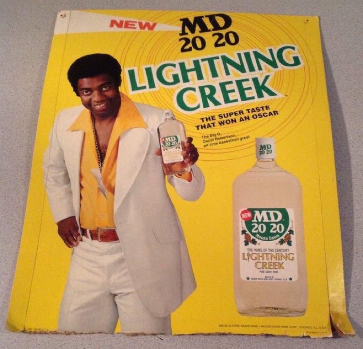 Super70sSports's tweet photo. When Oscar Robertson tells you to drink like a homeless person, you’re goddamn right it’s time to start imbibing. https://t.co/QerhuhTG20