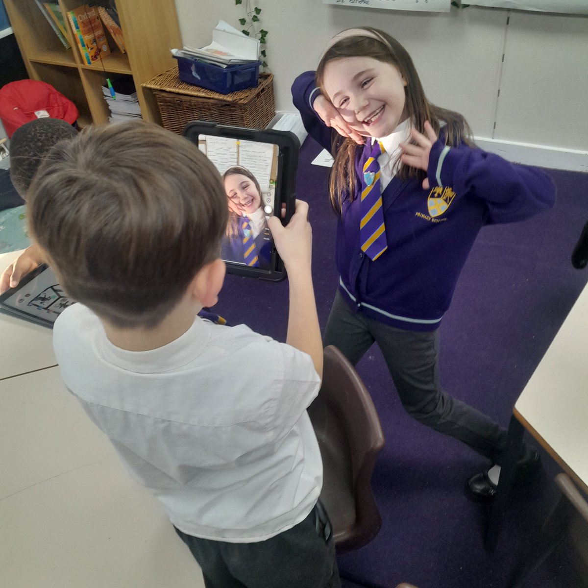 StAlbans_Sch's tweet photo. As part of our computing lesson today, Year Two are playing 'Photograph bingo' using a device to capture a digital photograph #MrsF #computing https://t.co/x7xYiaxyFt