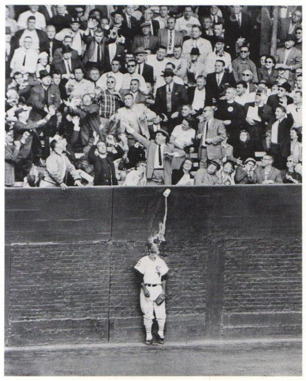 White Sox LF Al Smith being showered with beer in fifth inning, Game 2, WS. A fan in the first row leaped up to try to catch the ball.
Chicago Tribune  called it...
'The Best Beer I Never Drank.'
Scoring at home?
'One hit, one run, one (social) error, nothing left in the cup'