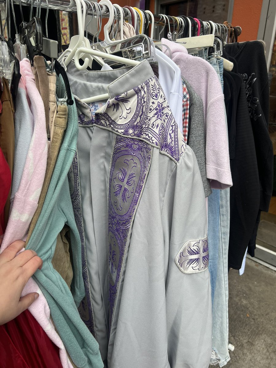 jessfocht's tweet photo. priest robe on the vintage sale rack seems like some kind of metaphor https://t.co/x5mbcf8UhW