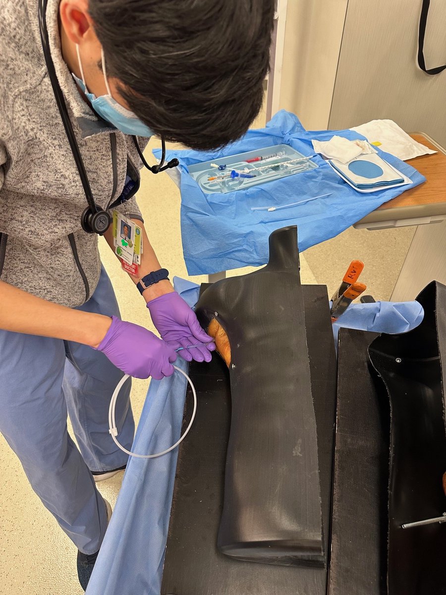 At yesterday's BWH Emergency Medicine In-Situ for Pigtail Catheter Placement, clinicians practiced their respective procedural steps. Using a hard plastic shell, the model allows for the insertion of local grocery store pork ribs to simulate a realistic feel for providers.