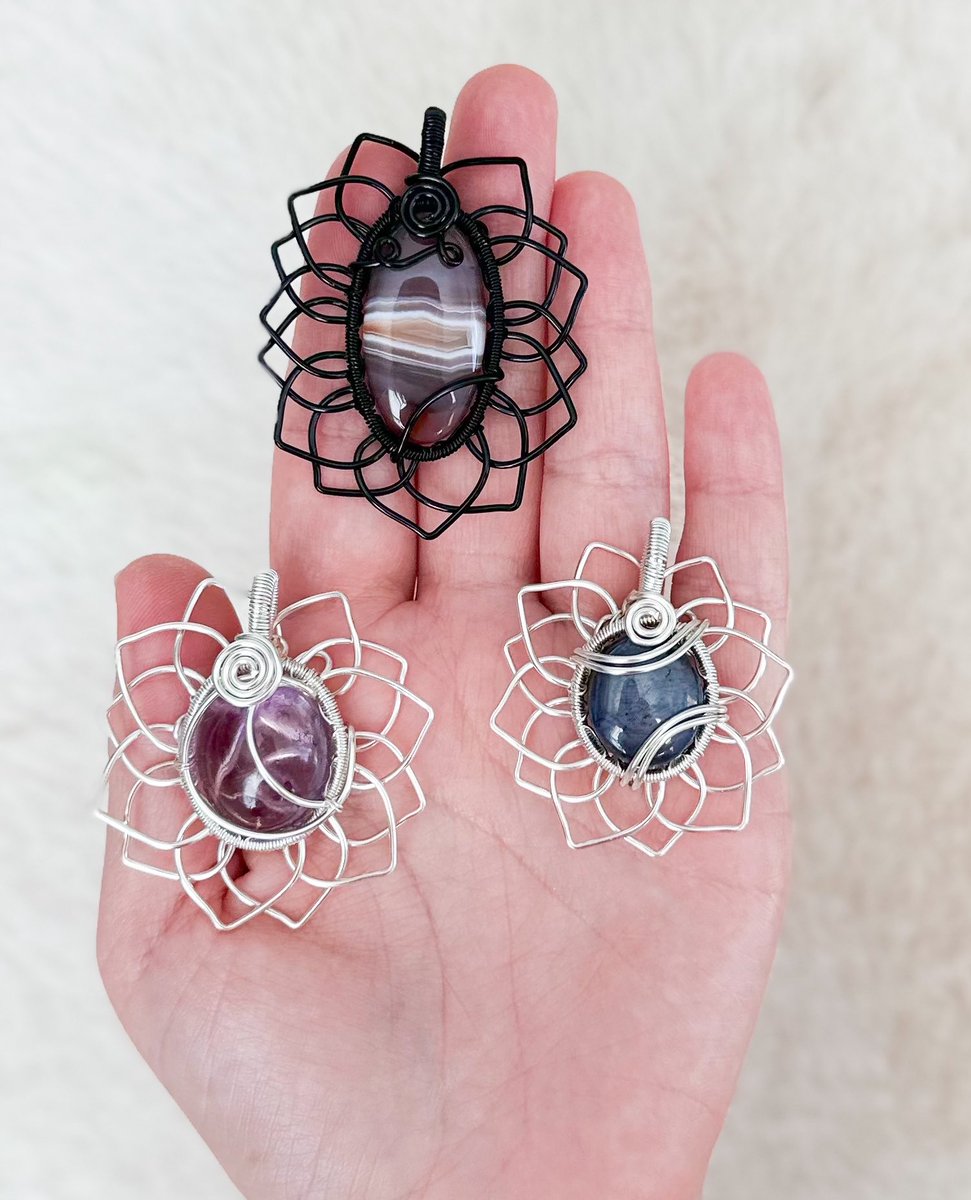 handful of purple sun & sunflower pendants💜