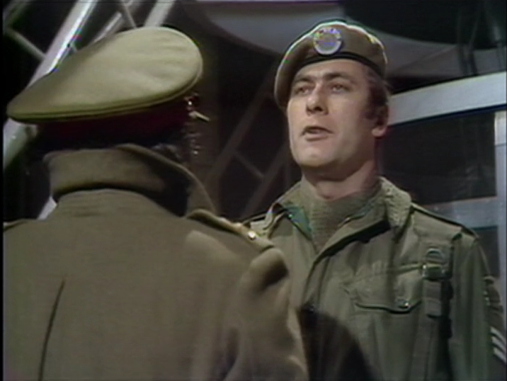 DWUDatabase's tweet photo. The Master walks into the middle of a nuclear power complex wearing a hat and what looks like a rubber mask of his own face. He doesn't even need to bother hypnotising Benton who just stares over his head. UNIT security at its best #DoctorWho #ClawsofAxos https://t.co/hhbsfFG6UA