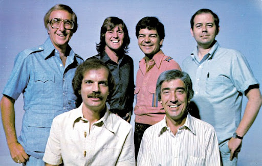 terrymeiners's tweet photo. 1970s @840WHAS host Steve George (lower left in the team photo) jumped back on the air with me today.
Perkey, Metz, Burbank, et al. were groovy bellbottoms & wide sideburn sportin' deejays!
radio audio 🗣️ https://t.co/ZQVQaJxsKB
#WHAS100 #radio #Louisville #loumedia https://t.co/q6919fbyRT