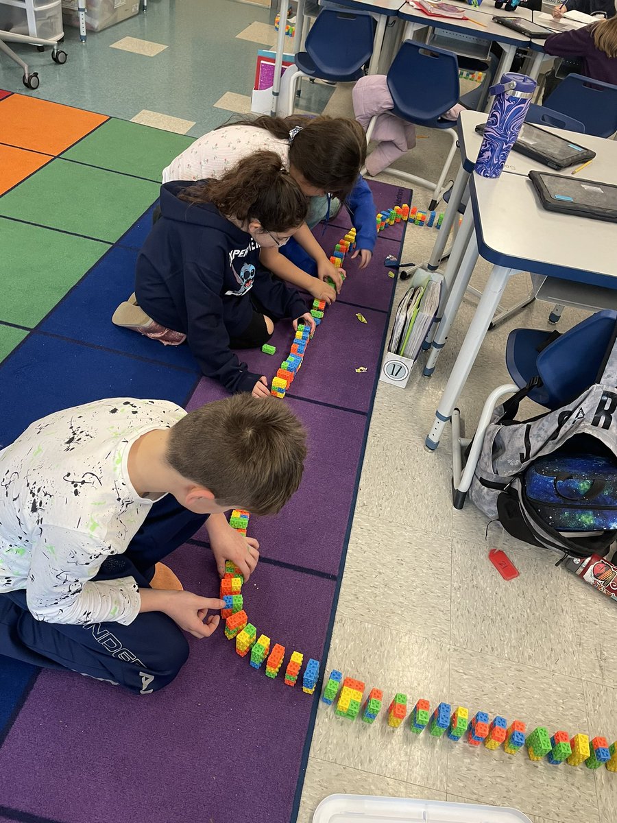 barrcaveclass's tweet photo. Recess engineering!! Last indoor recess, Ss were frustrated building this chain bc when blocks were accidentally hit, the whole thing came down. Today, they tried again, adding  in “stoppers” every 10ish blocks until they finished. Brilliant redesign! #stem #fourth #johnsonpride https://t.co/qIjoX5q7pF