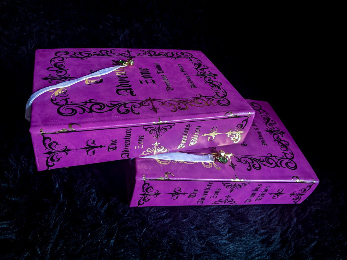 Midnight_mary_'s tweet photo. I can’t believe I haven’t shared this yet.
For Christmas this year I rebound the first three volumes of The Adventure Zone into a special edition omnibus edition.
I made two separate copies for my partner and one for his sister.
#theadventurezone #adventurezone #thezonecast https://t.co/Zl5nwo4TnD