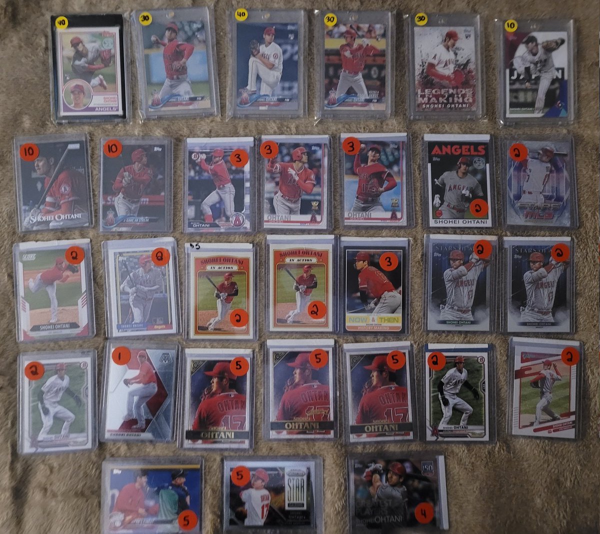 StveLikesStuff's tweet photo. Here's a first batch of Ohtani. 
Acuna, Alonso, Quinn and Jack Hughes, Panarin next. 

US $260 
CAN $350

Lots of freebies, and they are 10s. I keep my collection clean and protected

#Ohtani #MLB #Cards #Hobby https://t.co/jCtz6da9ub