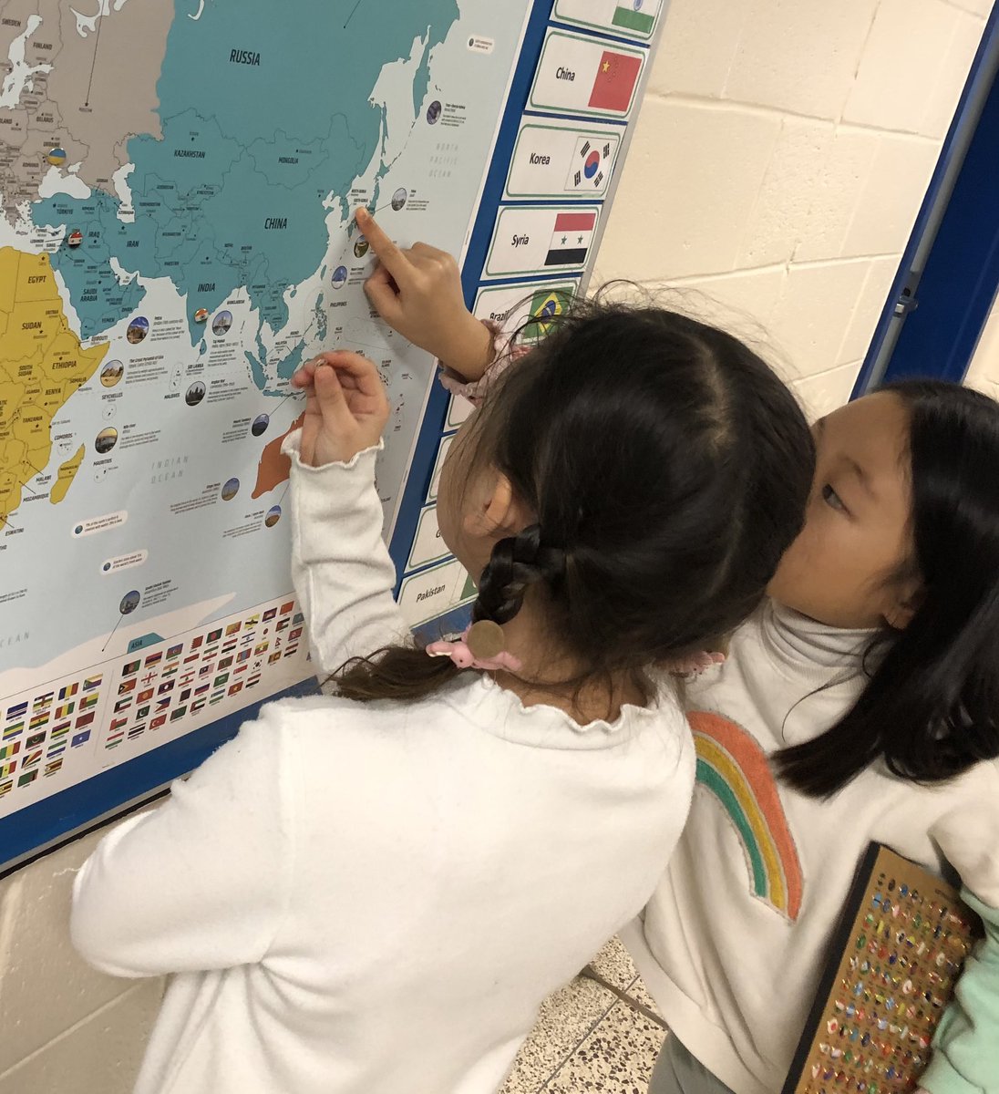 EALssrce's tweet image. Adding home country flags to our school world map! So amazing to hear the stories of how our students arrived to Canada. 🌎🇨🇦