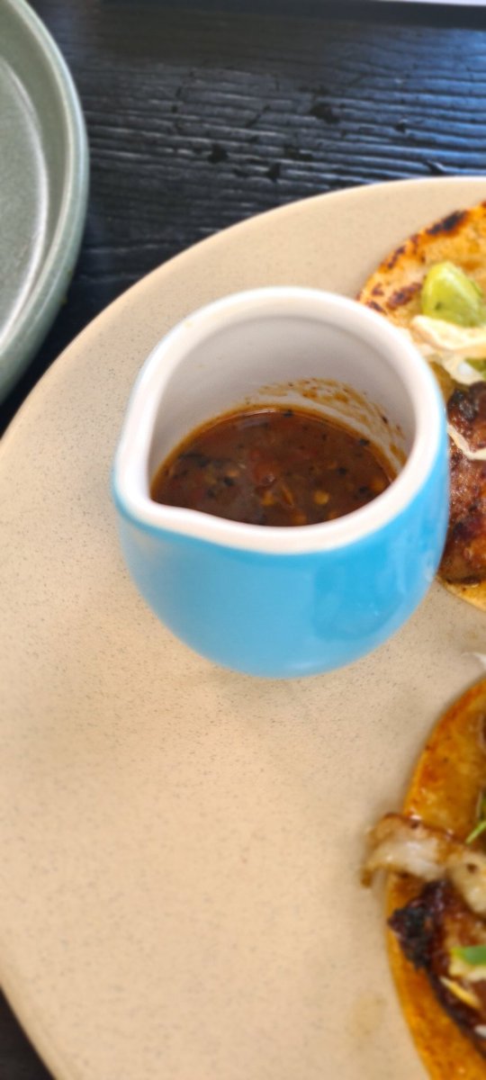 FreoLou's tweet image. Third Course Pork Belly Tacos with arbol chilli salsa and Steacciatella (cheese) and stone fruit #Rustico

Husband cannot speak due to being in love with the taco he is eating