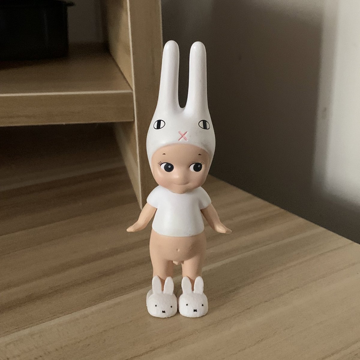 brian comfy in his miffy slippers