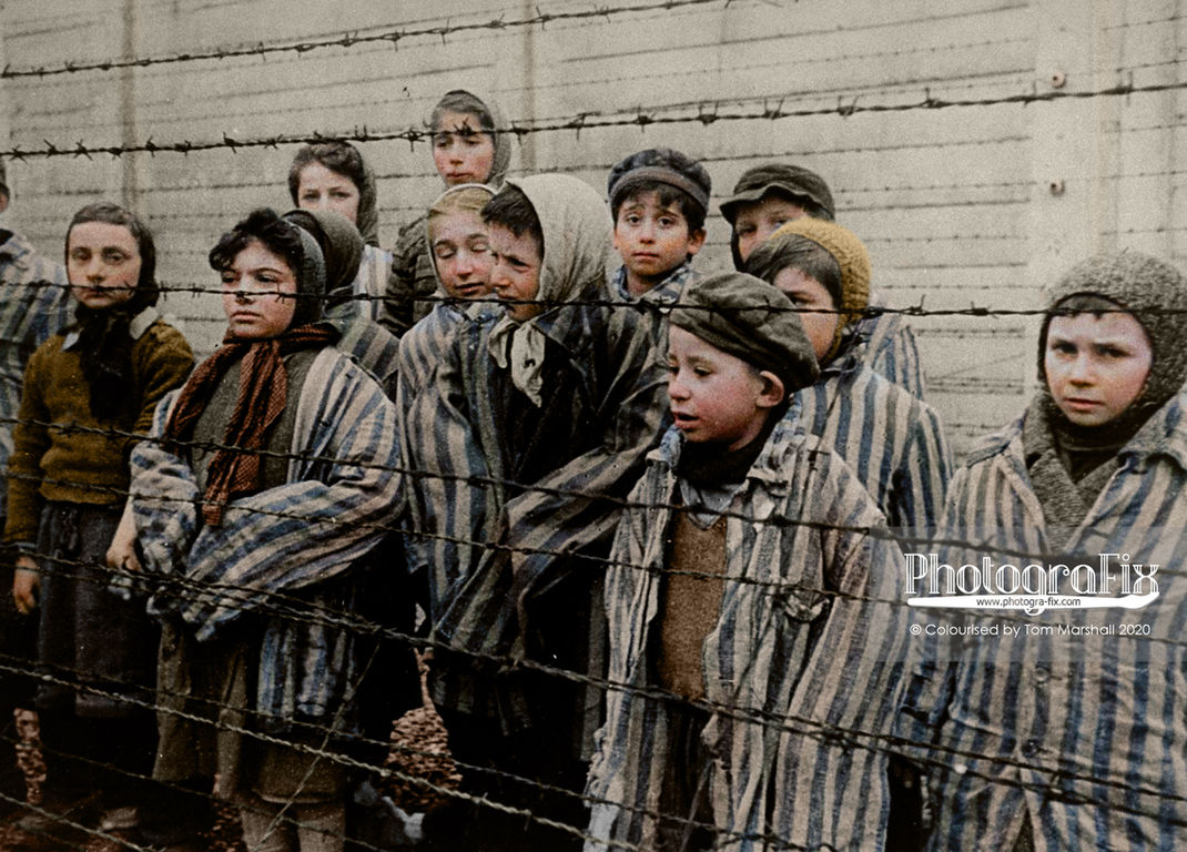Children at Auschwitz, in a still from the Soviet film of the liberation of Auschwitz, January 1945. Colour by @PhotograFixUK