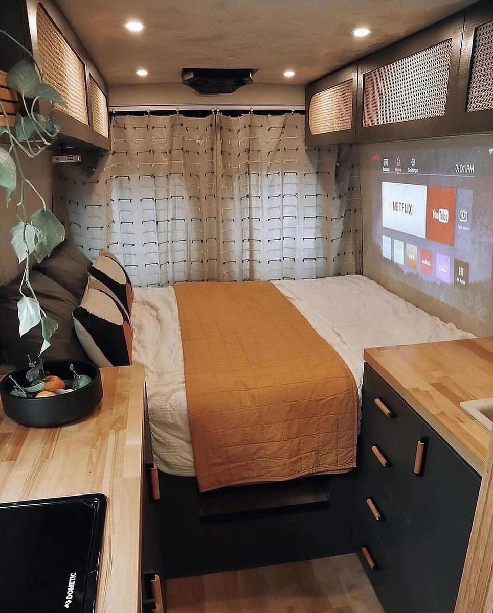 Exploring @vanlifecamps' dreamy campervan interior - where every detail screams comfort! 

From the snug blankets to the ambient lights, and a projector setup for the ultimate Netflix and chill vibes on the road. 🚐

#camperbuyer #campervaninterior #vanlife #camperdesign #living