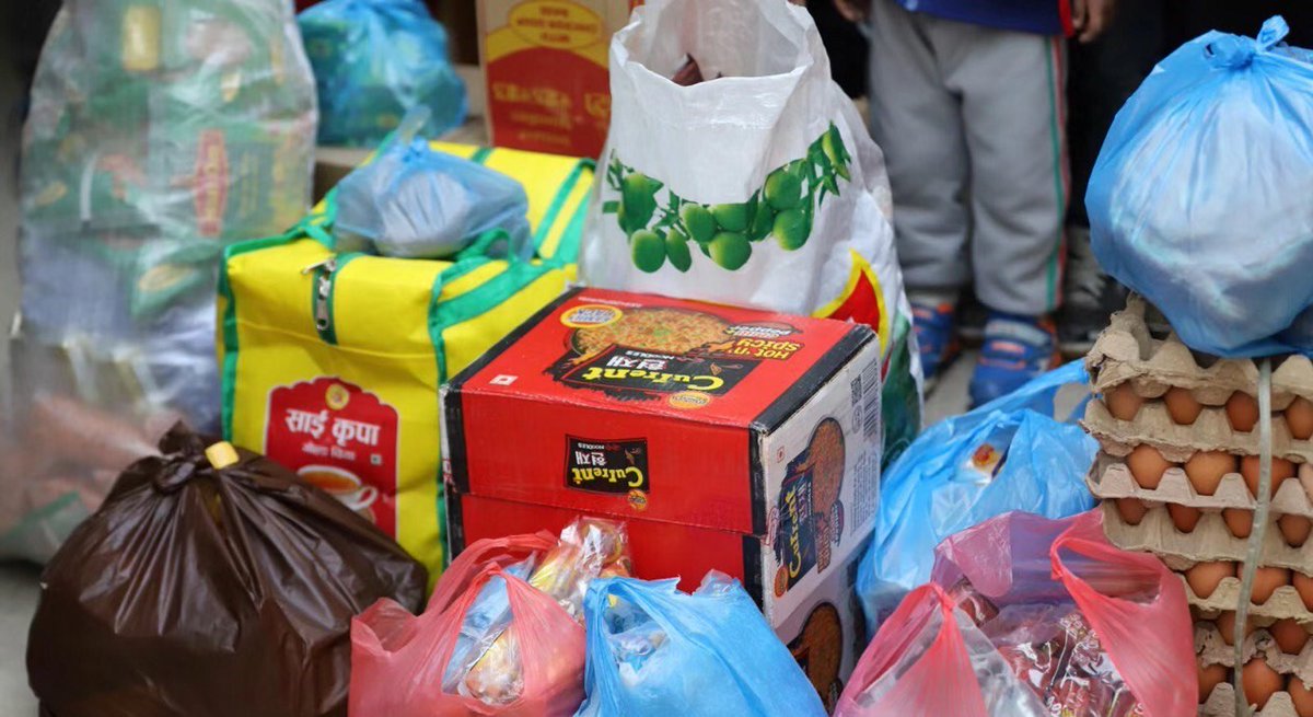 This is a group of children in an orphanage and the unpaid volunteers who take care of them. They have no parents or relatives, only the HIV virus carried from their mothers. The whole house is like a mini prison. They don’t even have toys because they don’t have food to eat. ...