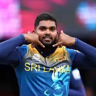 SportieZone's tweet photo. @ICC #DebutHeroics 🎩🔥 Making his ODI debut against Zimbabwe on July 2, 2017, Hasaranga etched his name in history by taking a hat-trick in his first match, becoming the youngest bowler to achieve this feat in ODI debut history. https://t.co/iZleXEXunU