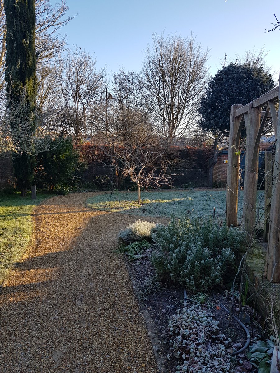 A perfect winter's day in #KingJohnsGarden. A touch of frost and a perfect blue sky over the medieval house