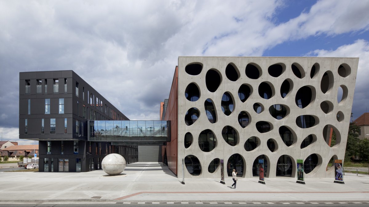 Sika's tweet photo. In Czech Republic, the Nove Divadlo Theatre redefines #concrete design with a striking #facade created using special solutions. Follow the link to find out more about this project: https://t.co/WRYNjpRZ99 https://t.co/uVPVCwdISw
