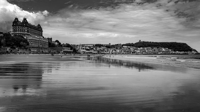The #beach of #Scarborough in #Yorkshire is an excellent place to get some #sea #air. Shot in #blackandwhite in #widescreen. See more #photography like this at darrensmith.org.uk #blackandwhitephotography #visityorkshire #YorkshireCoast. Contact us for a #print or to book us