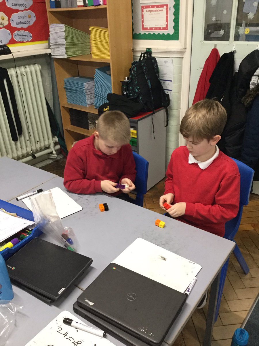 Using cubes to support our understanding of division with remainders. <a href="/HaxbyRoad/">Haxby Road Academy</a>