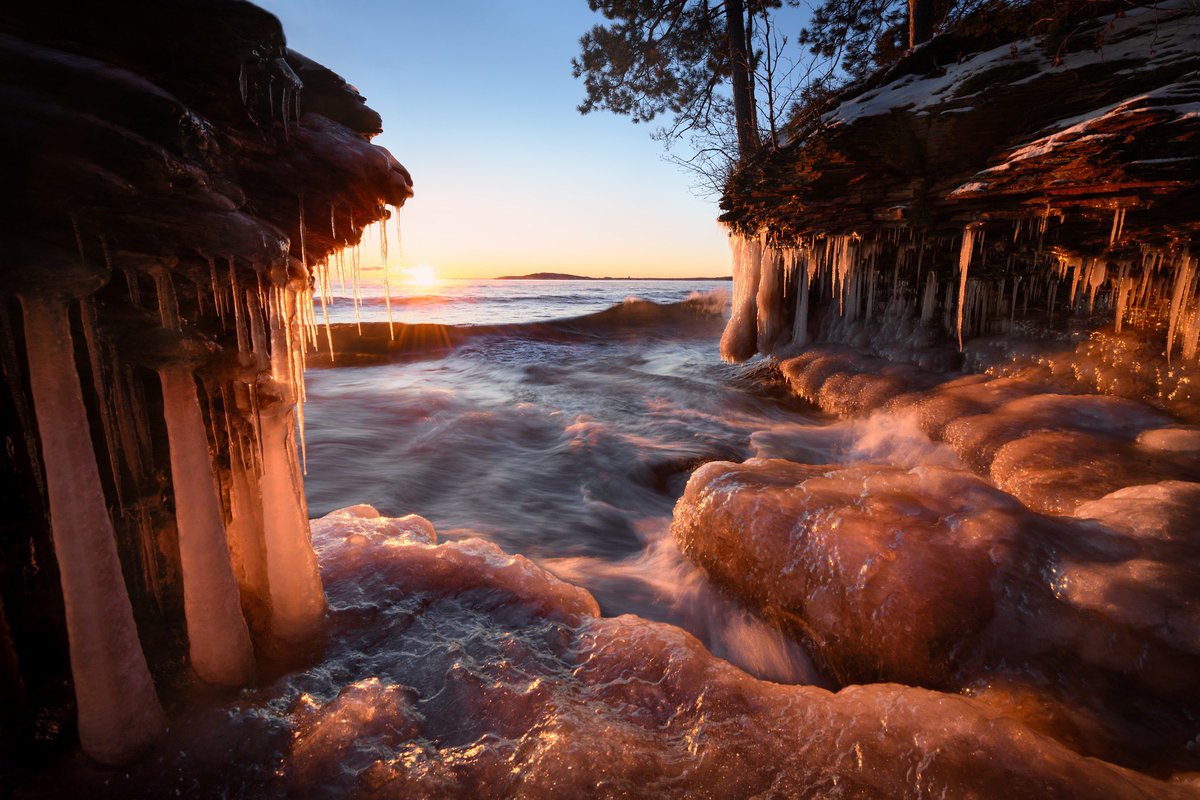 A Lake Superior sunrise from an ice-covered shore near Marquette.  
#puremichigan