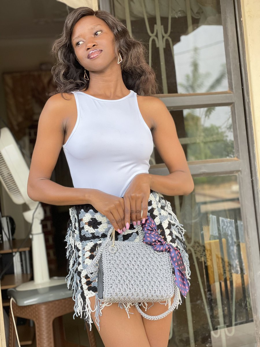 Imagine making your own outfits using threads 
Skirt and bag made by celine crochets 🧶