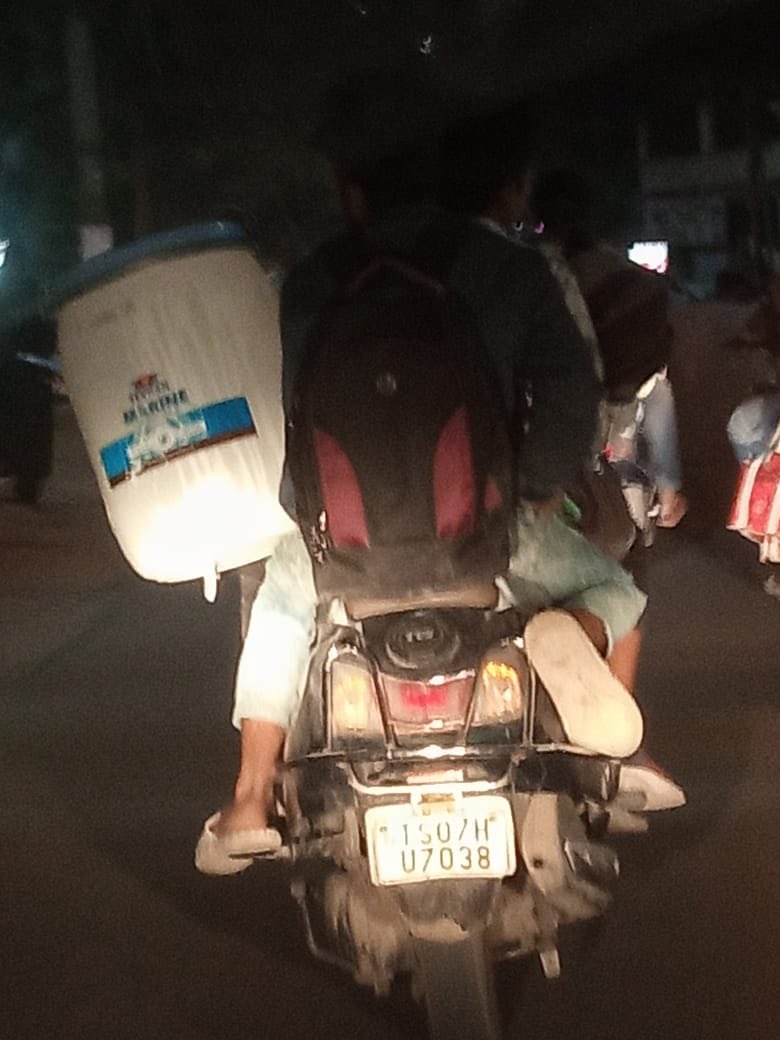 saideepak1's tweet photo. @HYDTP Rash Driving, triple driving and without helmet carrying heavy drum causing inconvenience to other travellers on the road on Tulasi Vanam Road KPHB at 6:45PM TS07HU7038 https://t.co/G8gsqKDXDB